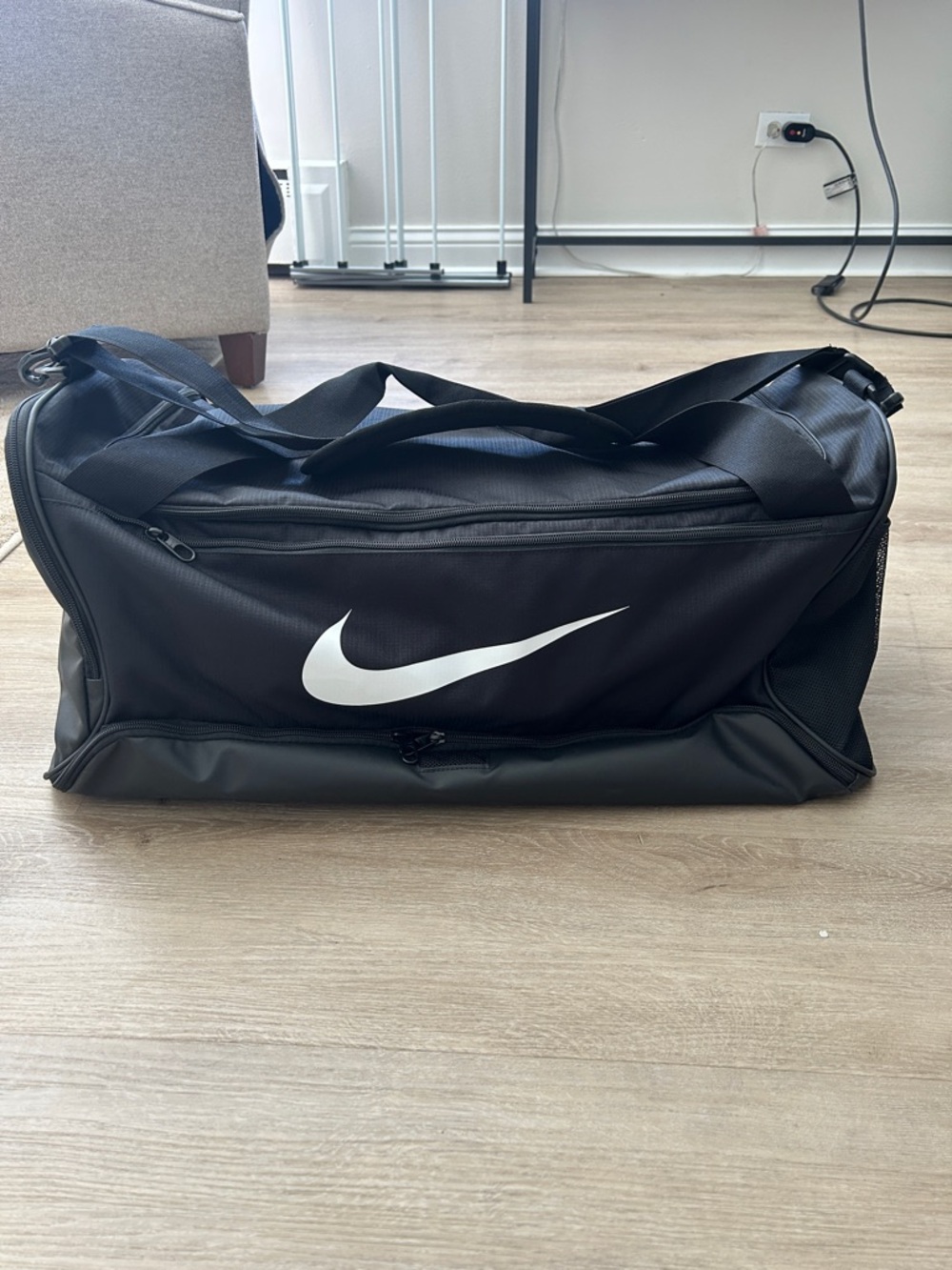 Nike Black Duffel Bag with White Swoosh